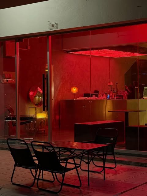404 Coffee illuminated interior and terrace